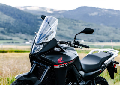 Honda XL750 Transalp riding on mountain trail