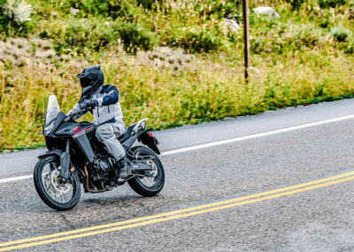 Honda XL750 Transalp riding on mountain trail