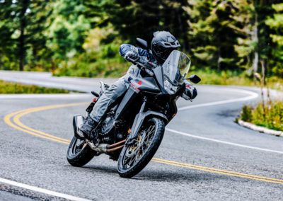 Honda XL750 Transalp riding on mountain trail