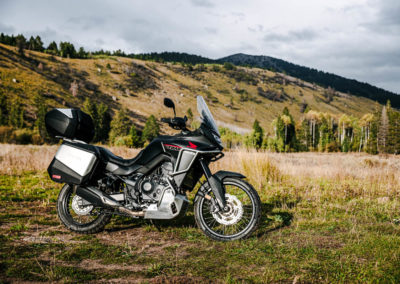 Honda XL750 Transalp riding on mountain trail