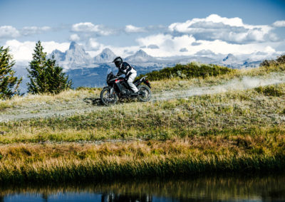 Honda XL750 Transalp riding on mountain trail