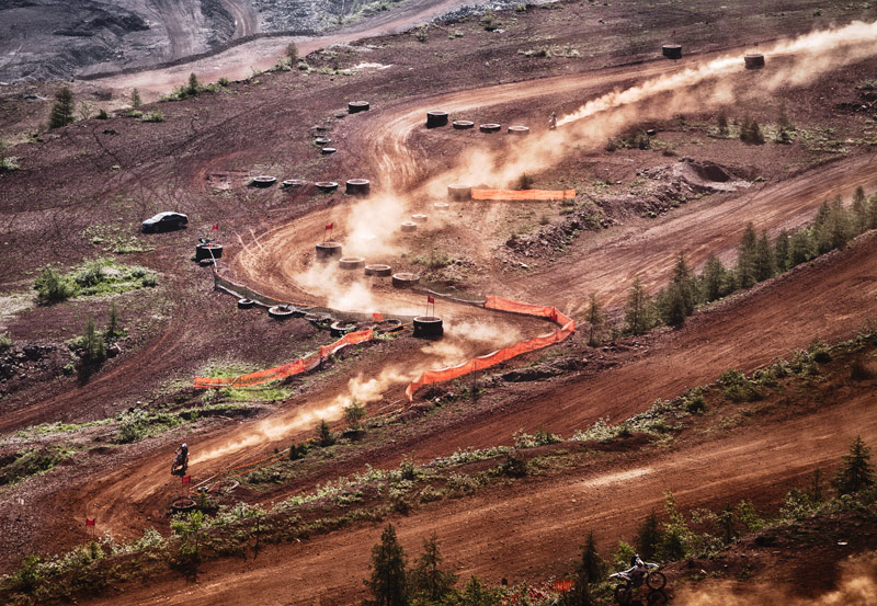 Riders tackling the rugged terrain of the Iron Giant during the Red Bull Erzbergrodeo